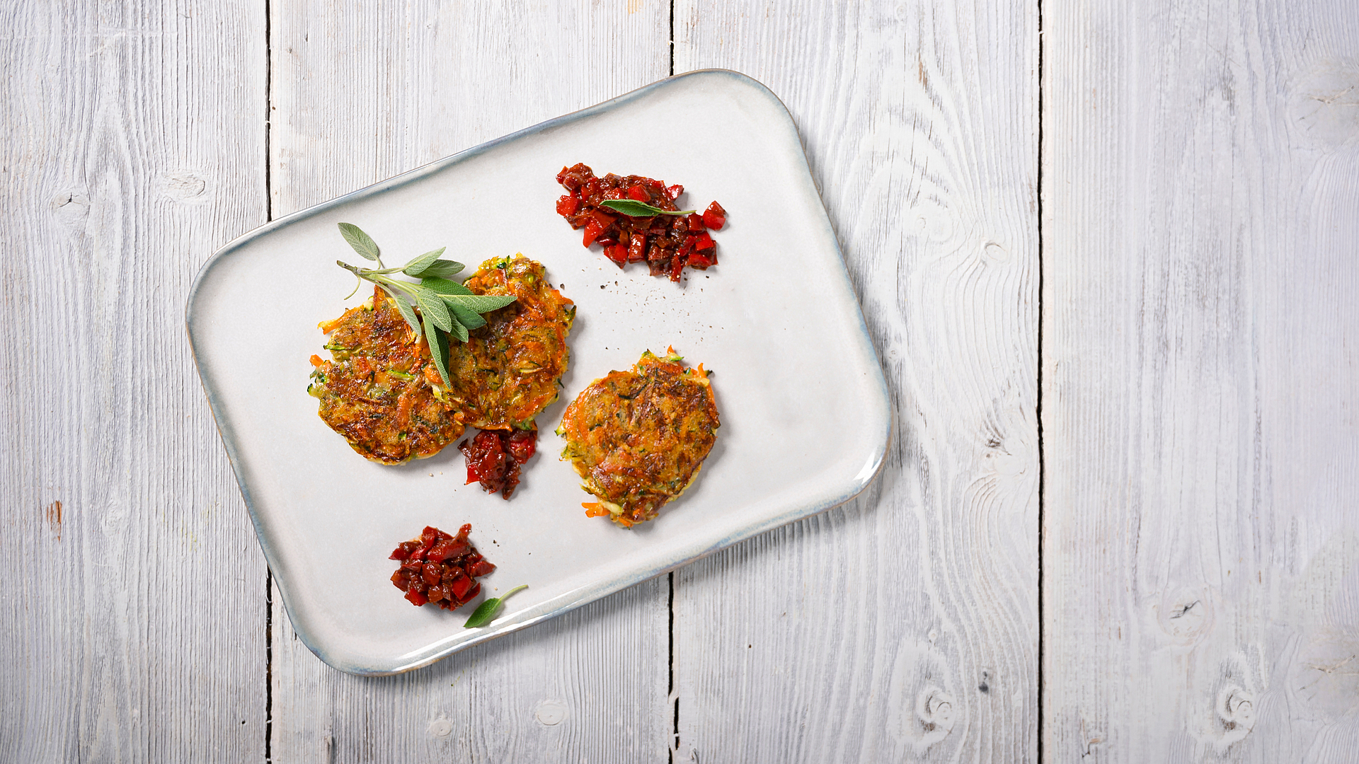 Courgette fritters with red pepper sugo