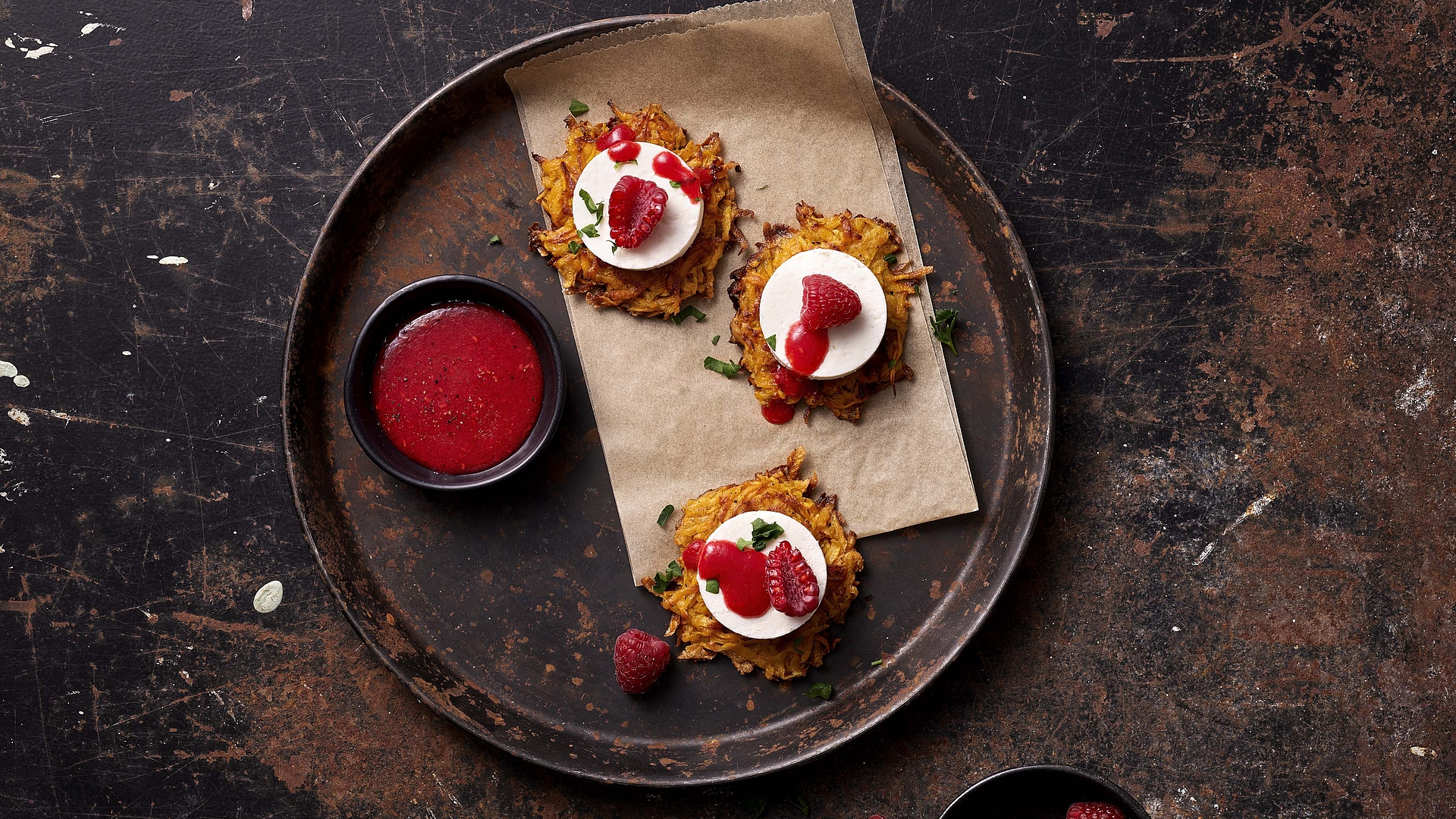 Sweet potato hash browns with feta and a raspberry dressing